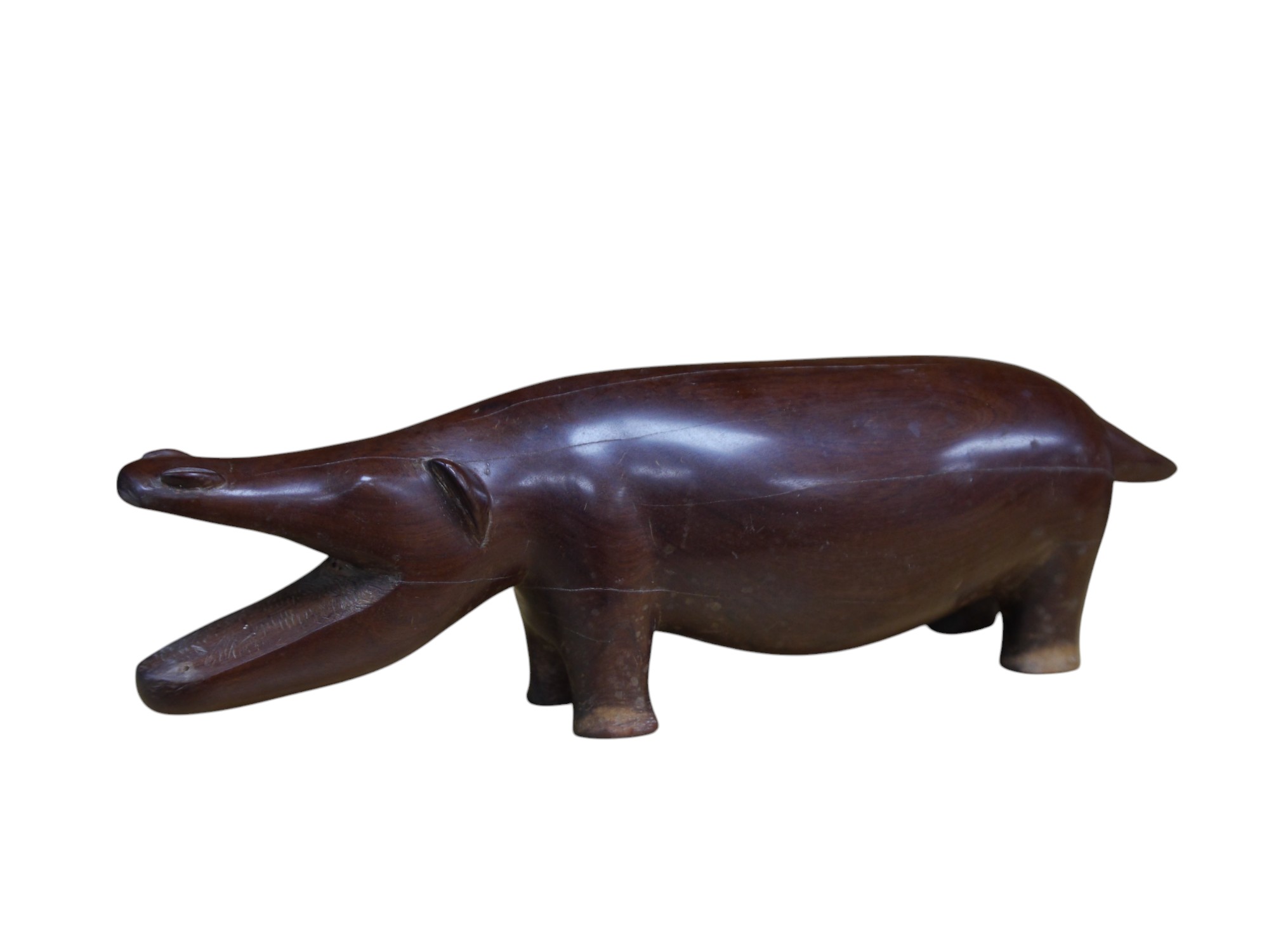 An African carved hardwood model of a hippopotamus, 45cm wide. Condition - poor to fair